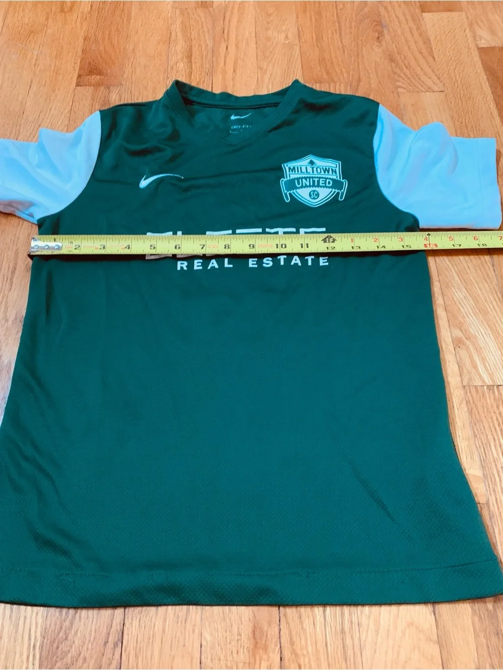 2 Nike Boys L Shirts : Defy Gravity' Nike tee and a green Milltown United jersey